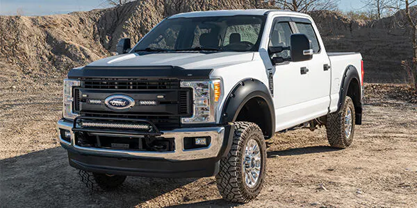 https://aw1.imgix.net/1/husky-liners/husky-aeroskin-II-textured-blk-2017-ford-F250_lifestyle-2830135-04.jpg