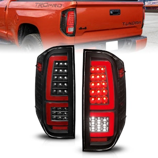 AnzoUSA 311436 Full LED Tail Lights w/ Red Light Bar Sequential Signal Black Housing Clear Lens