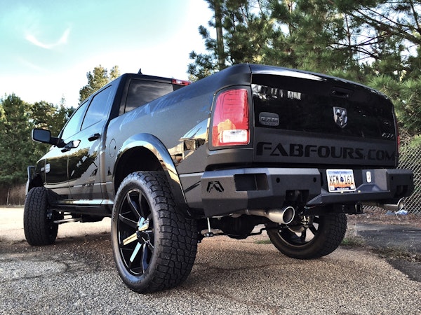 Fab Fours DR09-W2952-B Premium Rear Bumper withDual Exhaust and Sensor Holes Bare