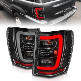 AnzoUSA 311394 LED Tail Lights with Light Bar Black Housing Clear Lens
