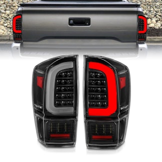 AnzoUSA 311400 LED Tail Lights with Light Bar Sequential Black Housing Clear Lens