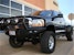 Road Armor 44062B (4x) 4-inch diameter : PIAA 510 or Quake LED QFR199 and (3x) Light Tabs on Titan