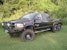 Road Armor 44062B (4x) 4-inch diameter : PIAA 510 or Quake LED QFR199 and (3x) Light Tabs on Titan