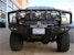 Road Armor 44062B (4x) 4-inch diameter : PIAA 510 or Quake LED QFR199 and (3x) Light Tabs on Titan