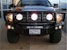 Road Armor 44062B (4x) 4-inch diameter : PIAA 510 or Quake LED QFR199 and (3x) Light Tabs on Titan