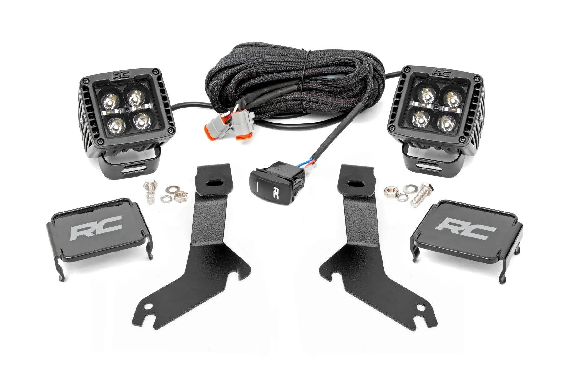 https://aw1.imgix.net/3/rough-country/99-06_chevy_1500_ditch_light_and_2in_black_drls_-_82281_82284.jpg