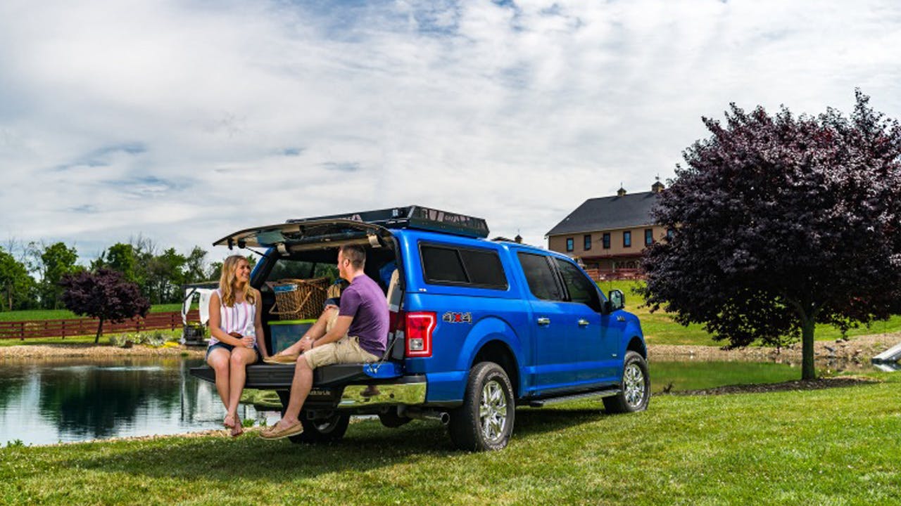 Placeholder image of an A.R.E. commercial unit with ladder rack and toolboxes
