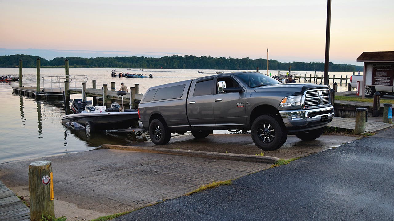 Placeholder image of a painted A.R.E. truck cap on a pickup