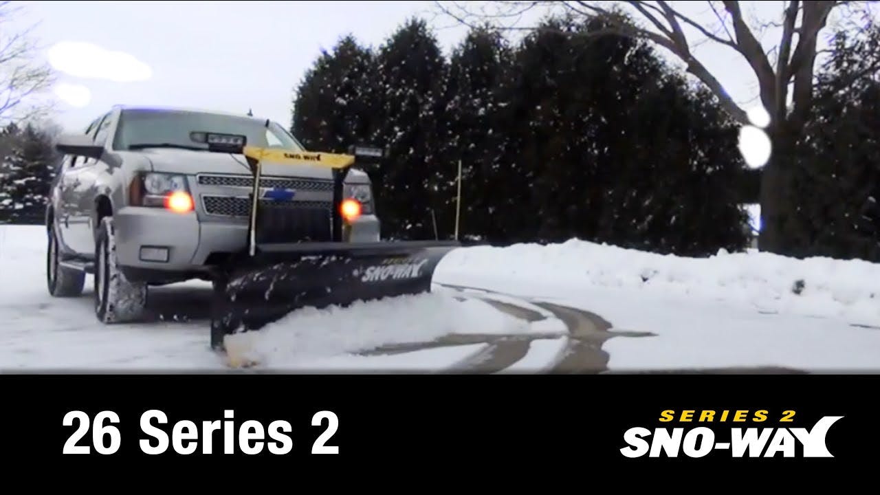 Sno-Way plow clearing a residential driveway