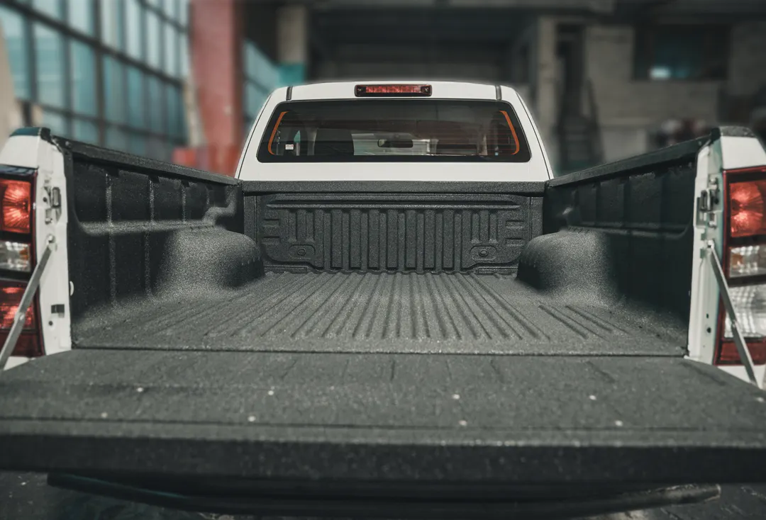 Arctic-grade spray-in bedliner installed in a truck bed in Fairbanks, Alaska