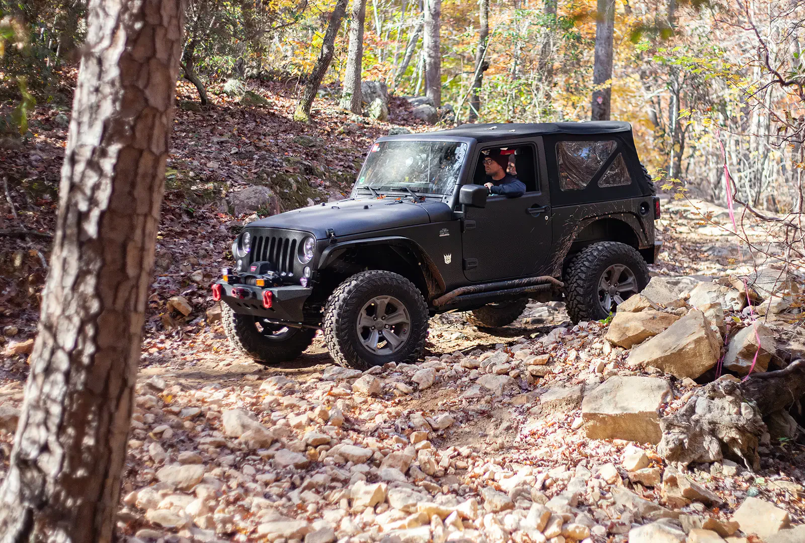 Jeep working through a rock section at Uwharrie