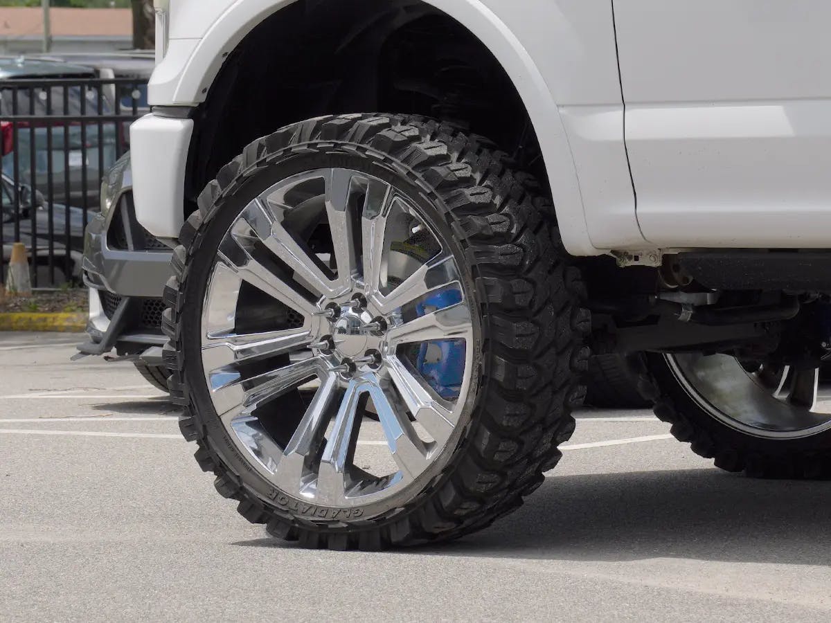 Caliper painting, wheels, and tires on a truck at Cape Fear Customs
