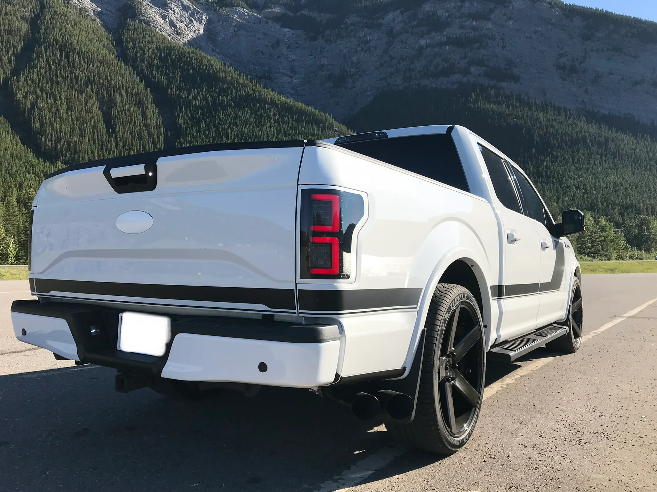 2017 Ford F-150 with tinted tail lights and Dub 24 inch gloss black wheels installed