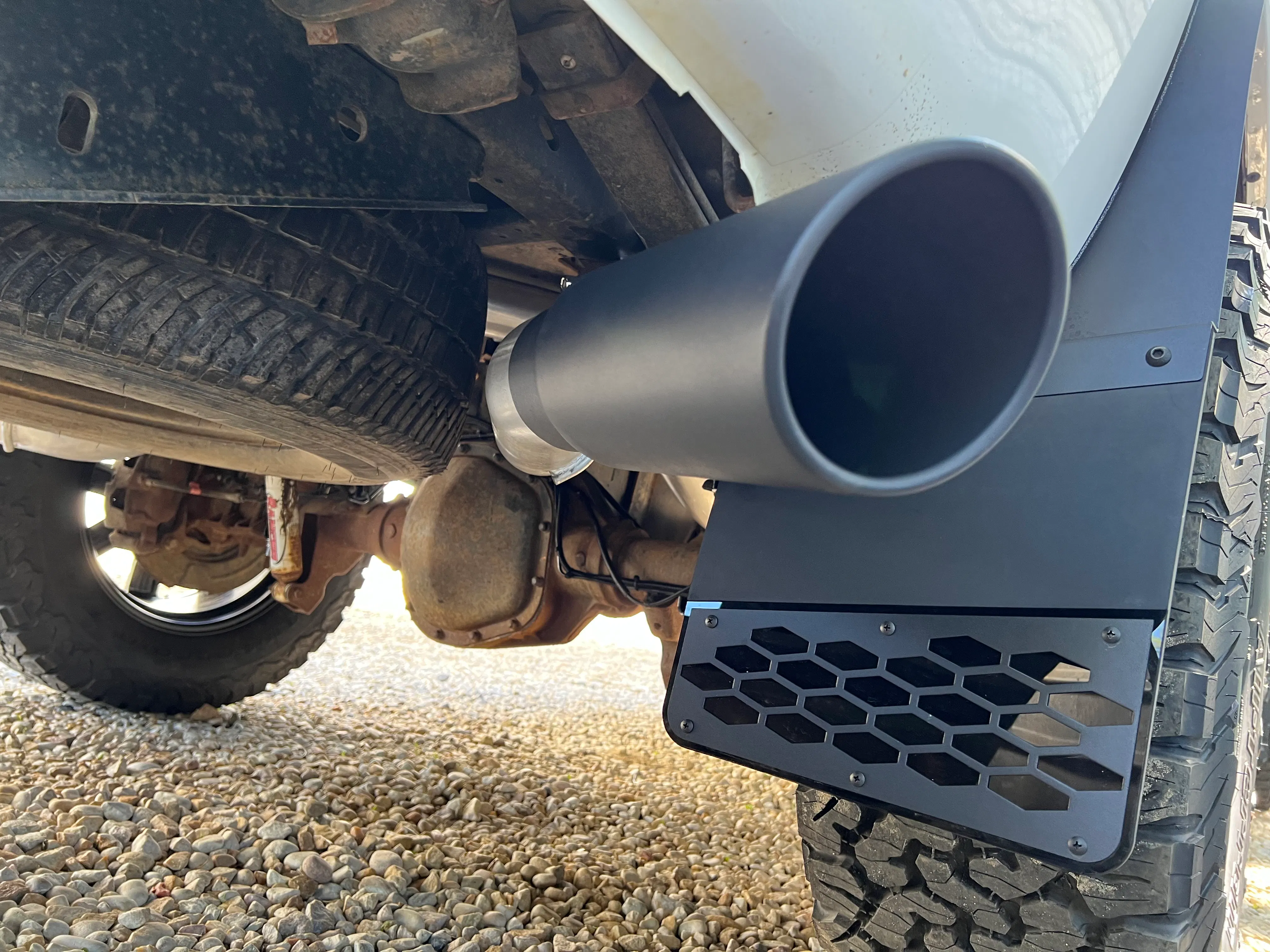 2014 Ford F350 with kickback mudflaps and Flo-Pro exhaust installed