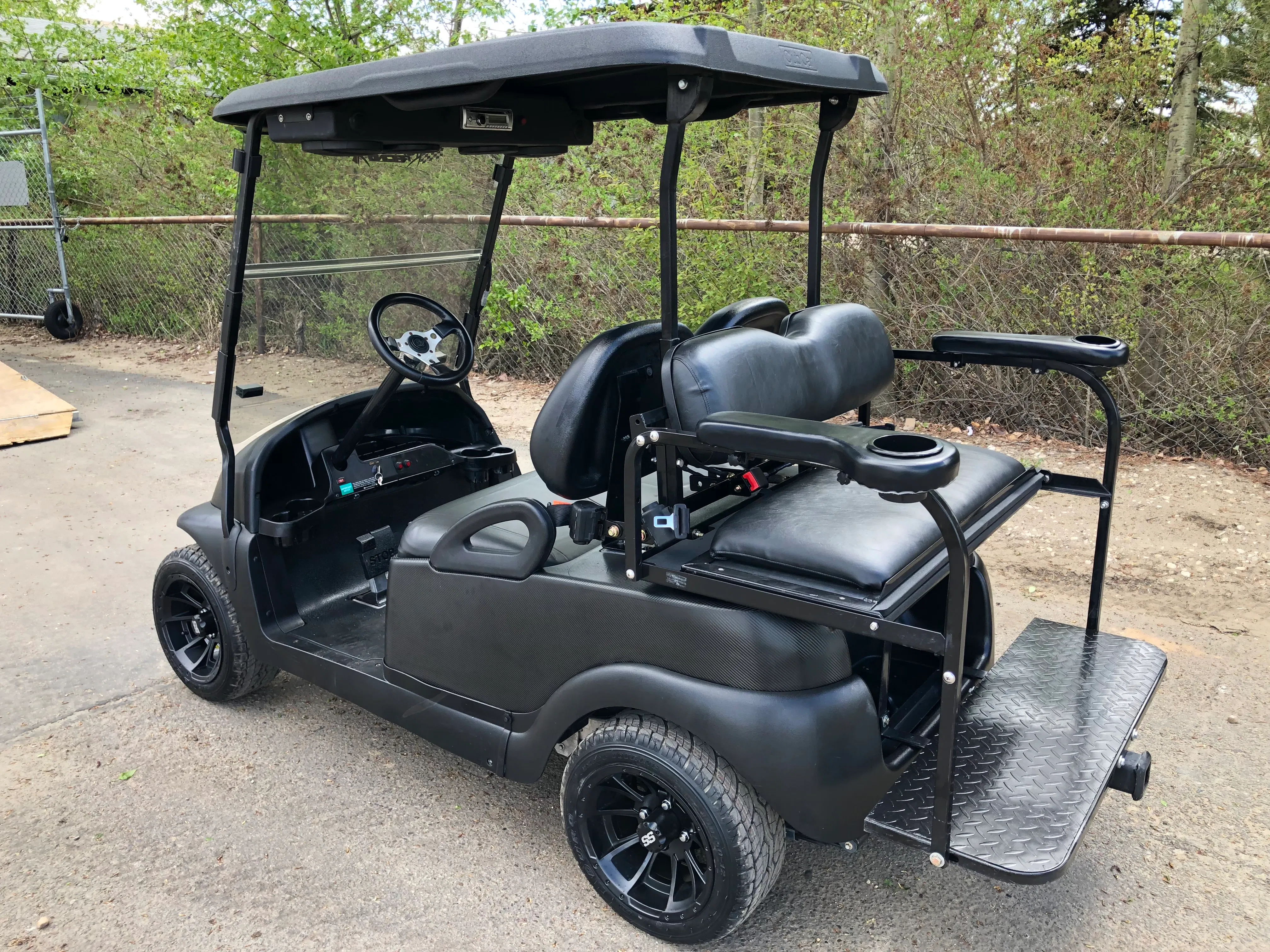 2007 Club Car with overhead console, marine stereo, speakers, and LED lighting installed