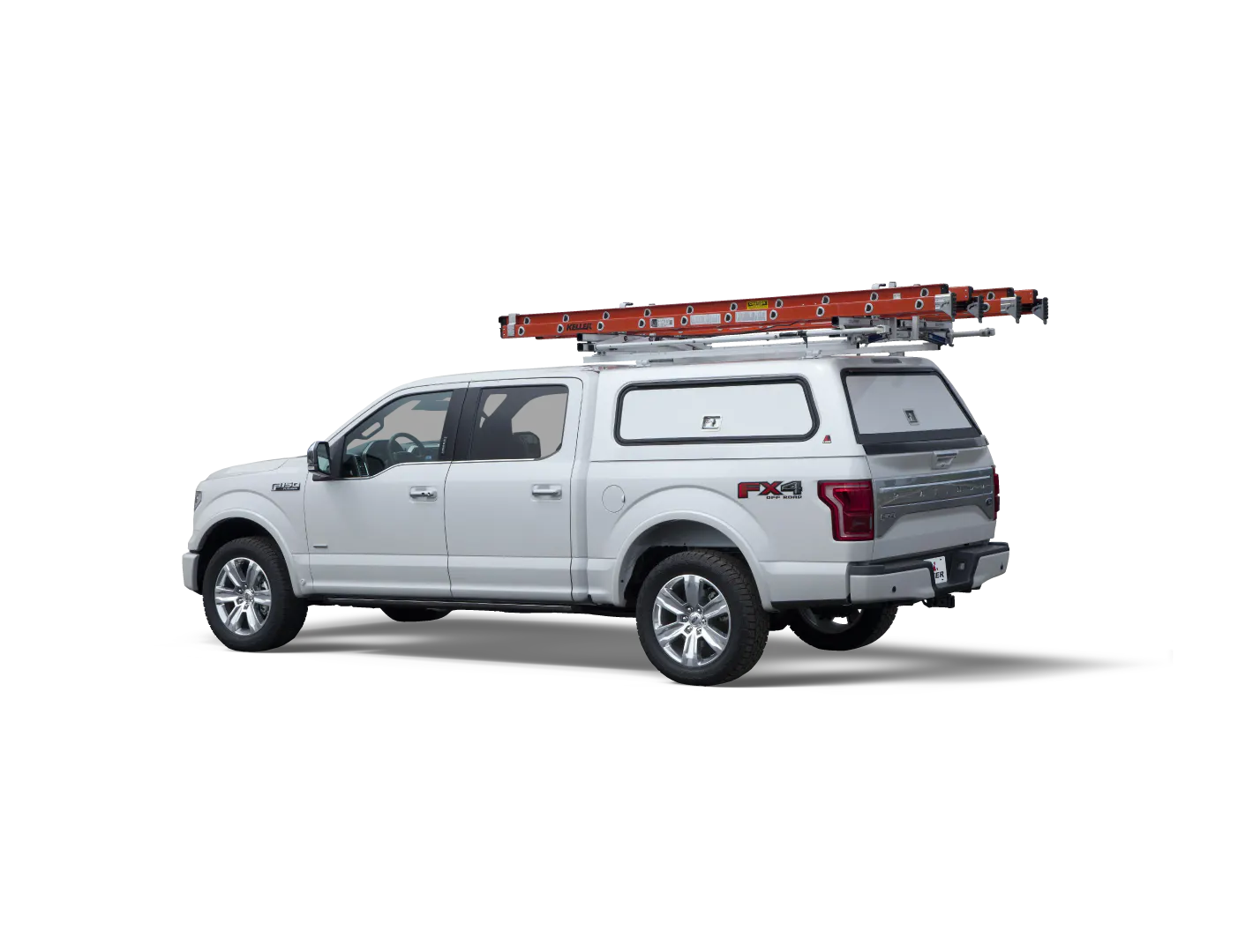 Commercial truck cap with ladder rack on a crew-cab pickup