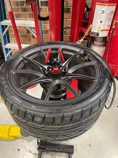 Street truck sitting on aftermarket wheels and performance oriented tires