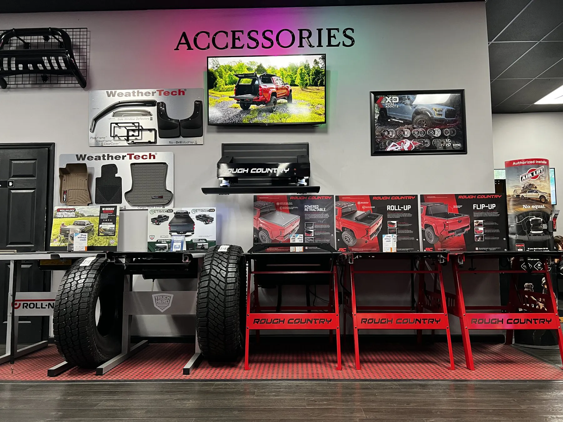 WeatherTech and vehicle-protection displays inside the MCOR Automotive showroom