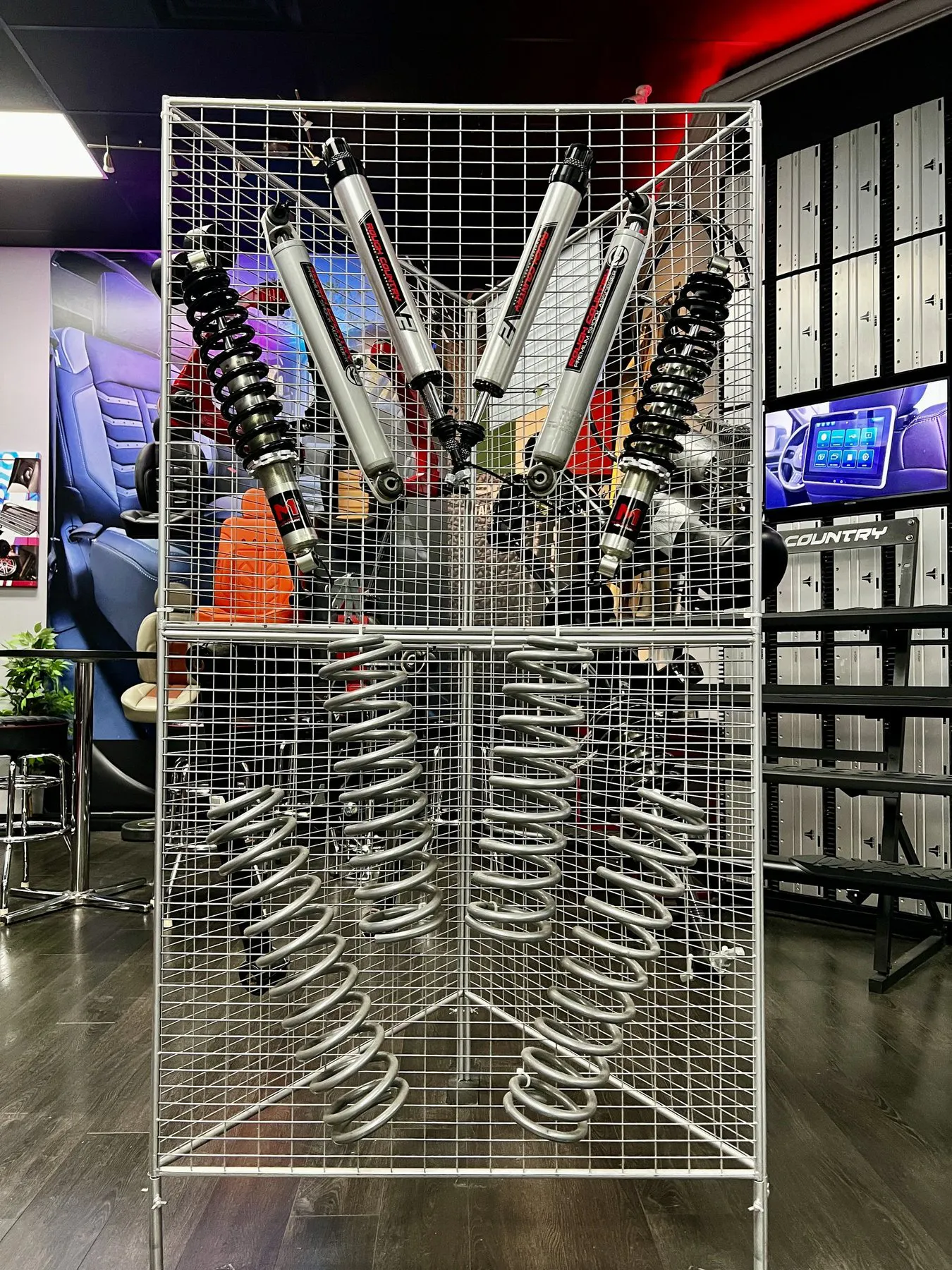 Rough Country suspension components displayed in the MCOR showroom