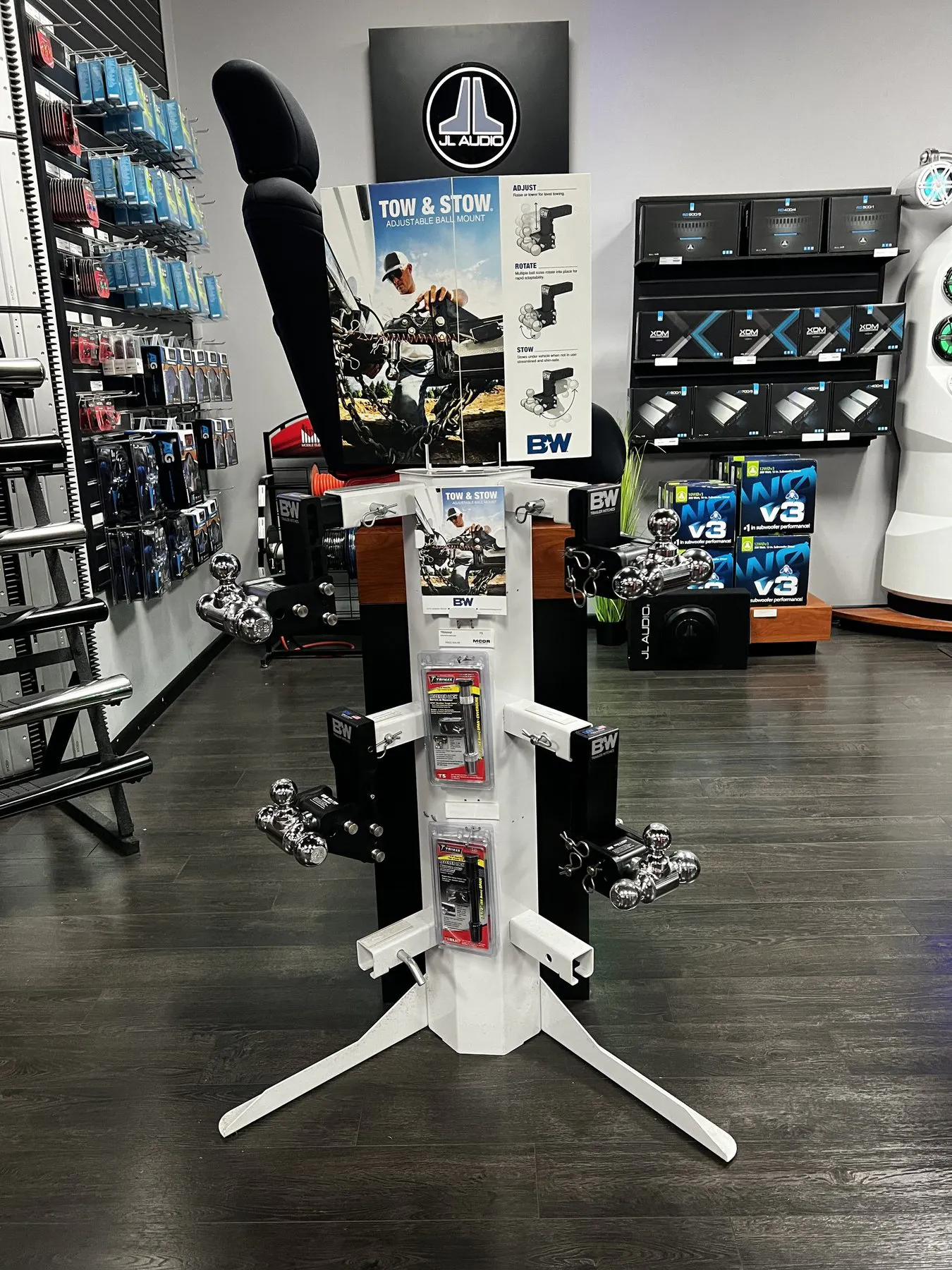 Trailer hitch and towing equipment display inside the MCOR Automotive showroom