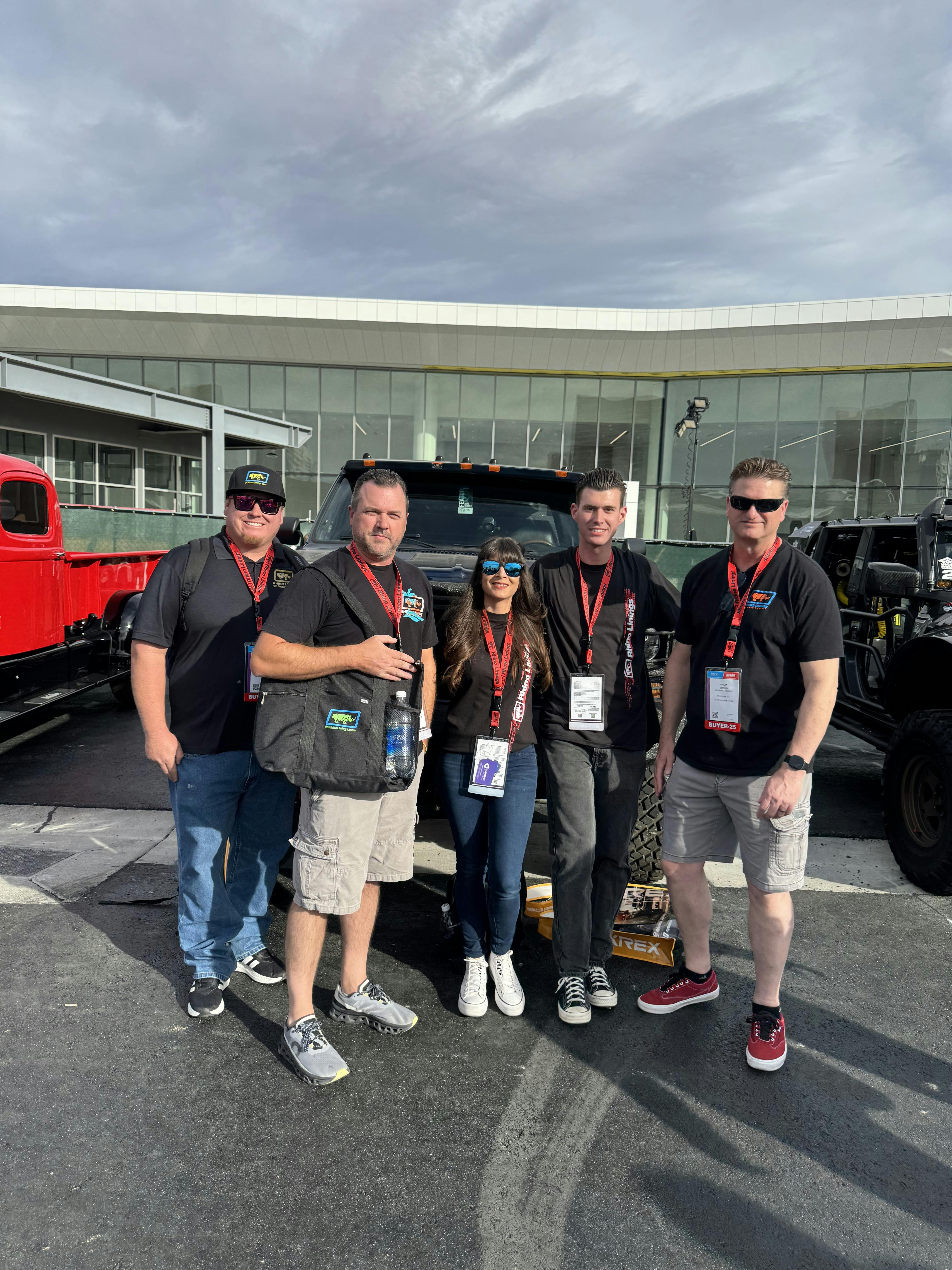 A group of people standing outsideAI-generated content may be incorrect.