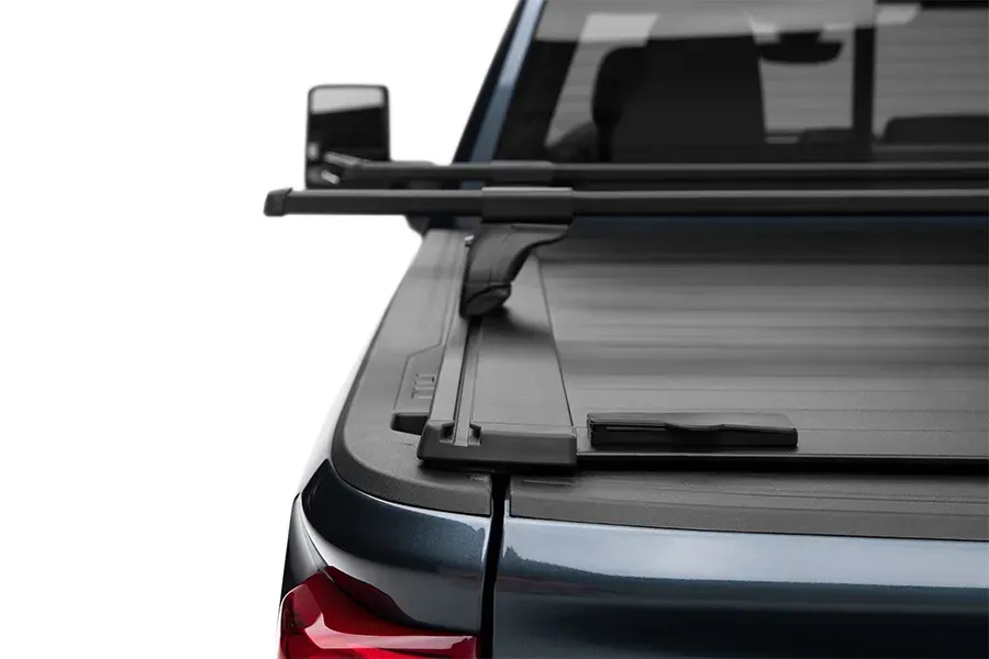Retractable tonneau cover with T slots